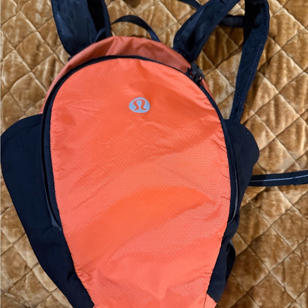 Lululemon Fast & Free 13L Backpack in Orange and Black